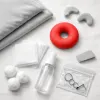 Dormir com piercing novo: travesseiros, posições e o truque do donut que salva helix e conch